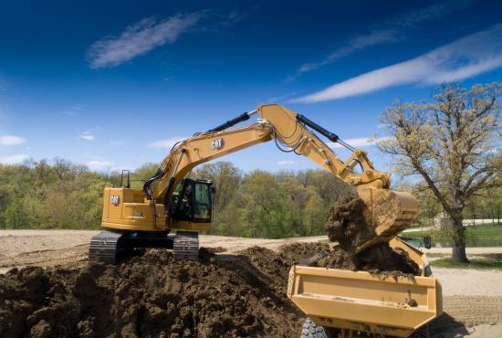 High Performance Truck Loading with a 335 Excavator