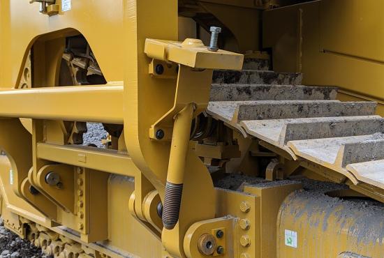 Pipe layer counterweight rod holder provides convenient storage when counterweights are removed for transport.