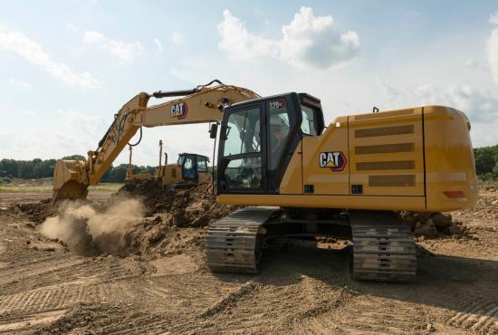 320 GC Excavator digging a trench