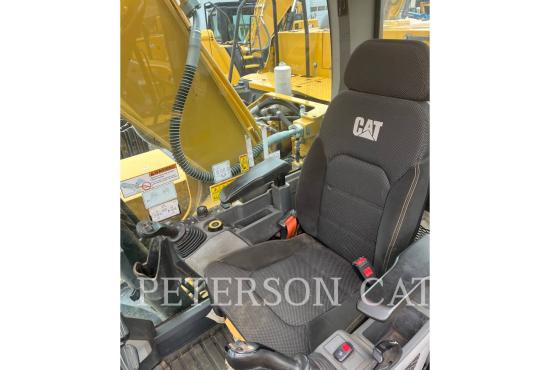 2023 CAT 323