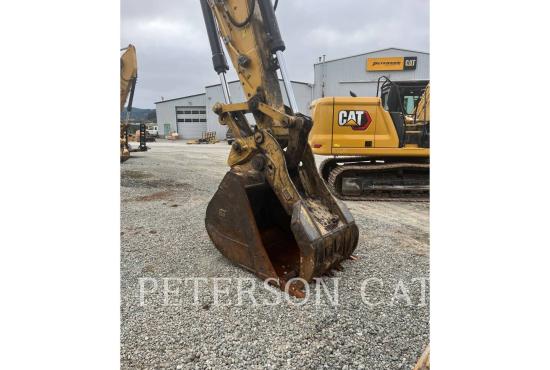 2023 CAT 323